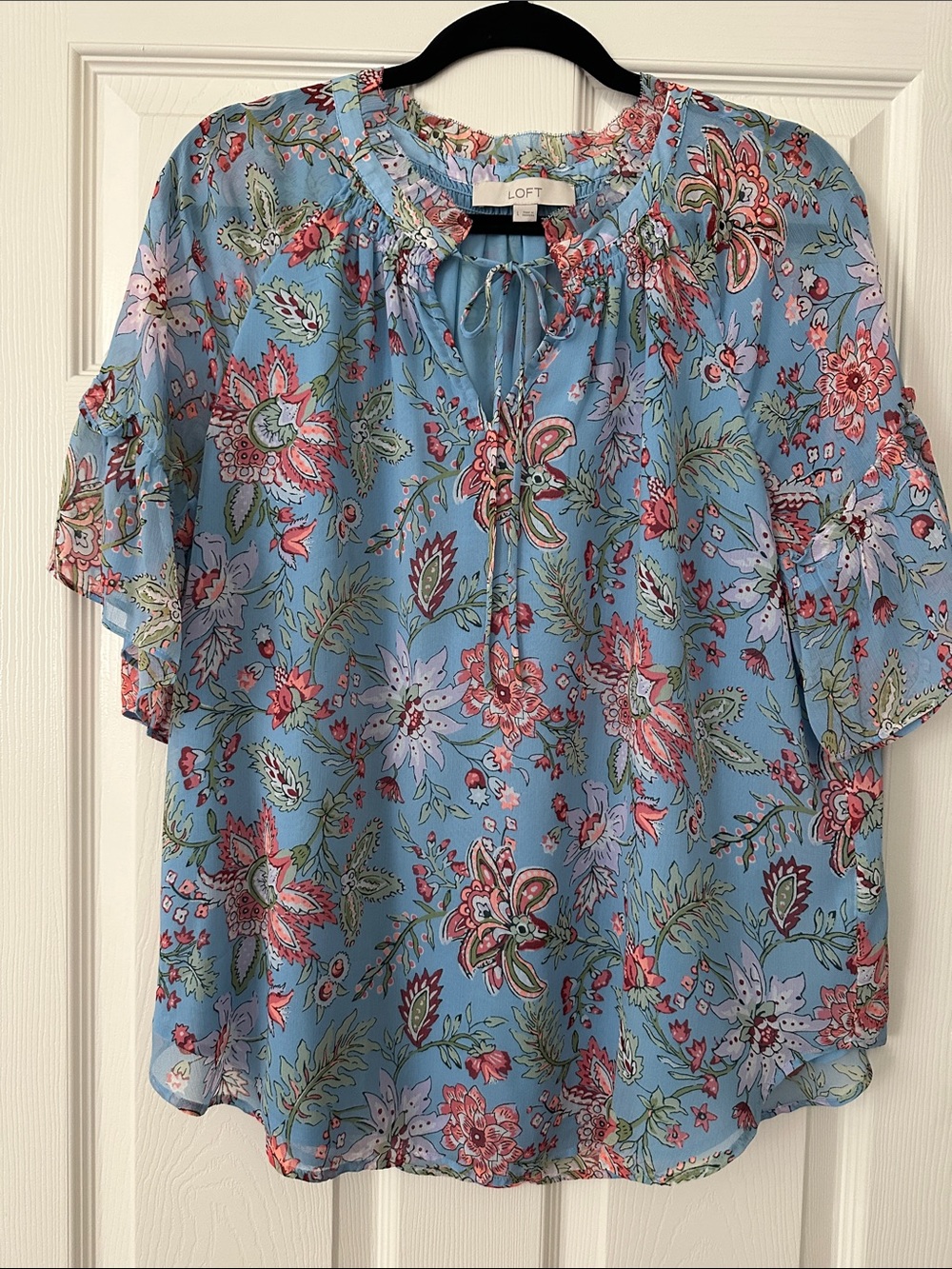 Light blue floral front tie blouse with pretty short sleeves